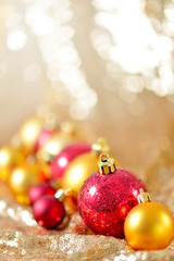 Christmas background, new year close up red and gold decoration balls on glitter abstract blurred holiday bokeh background