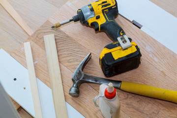 carpenter tools on wooden background