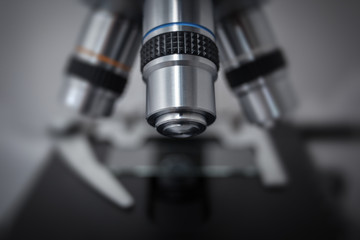 Fototapeta na wymiar Optical microscope - science and laboratory equipment. Microscope is used for conducting planned, research experiments, educational demonstrations in medical and health institutions, lab.