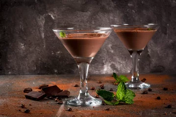 Rolgordijnen Cream coffee cocktail, chocolate martini with mint on black stone table, copy space © ricka_kinamoto
