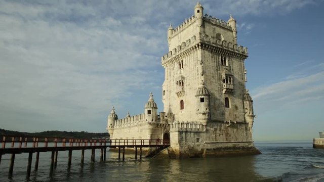 Belem Tower in low tide in the morning. Torre de Belem is Unesco Heritage and symbol of Lisbon, in Belem District on Tagus River. Belem Tower is the most visited tourist attraction in Lisbon, Portugal