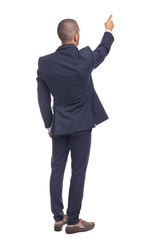 Business man in blue suit pointing with finger, isolated over a white background