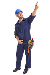 Portrait of a young worker pointing at copyspace