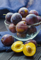 plums in a bowl