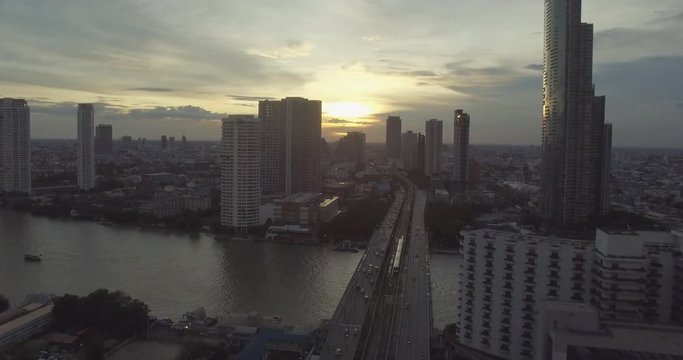 Sunset aerial view of Chao Phraya river in Bangkok, Thailand.
