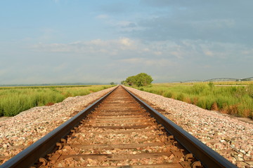 Railway tracks disappearing into the distance.