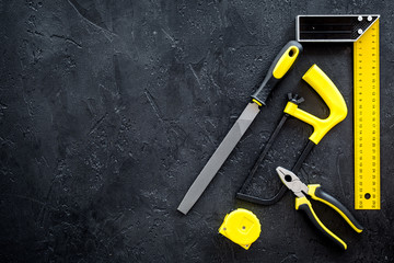 house renovation with implements set for building, painting and repair black table background top view mockup