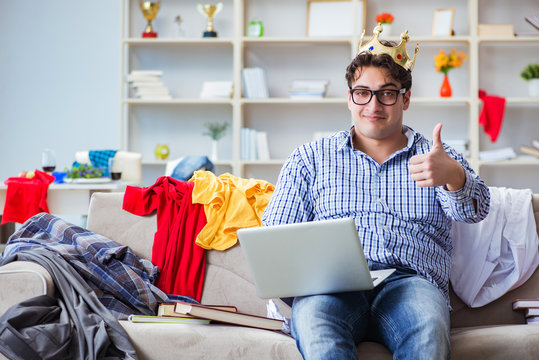 Young man working studying in messy room