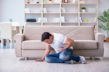 Fototapeta premium Man suffering from sick stomach and vomiting