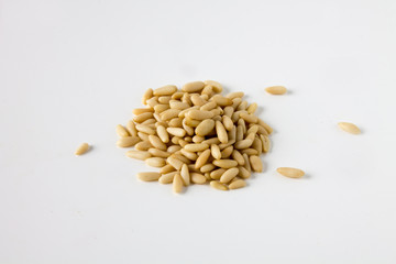 Isolated pile of pine nute on white background