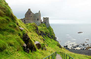 Dunluce castle in Northern Ireland, United Kingdom. Causeway coastal driving route on the Emerald Island. © Lyd Photography