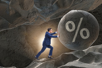 Businessman in high interest debt business concept