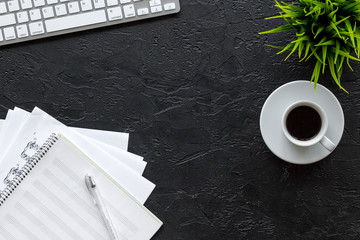 Desk of musician for songwriter work set with paper for notes dark background top view mockup