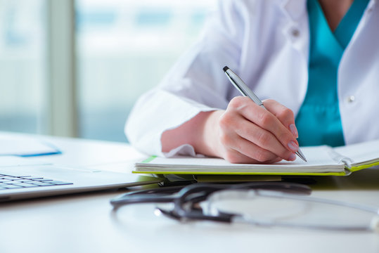 Doctor with prescribed medicines in medical concept