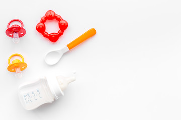 Mother care breast milk in bottle and infant formula powdered healthy food for baby feeding on white background top view space for text