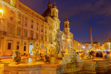 view of Piazza Navona and fountains in Rome at night, Italy