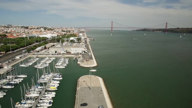 Panorama of Lisbon from Discoveries Monument or Padrao dos Descobrimentos platform: Hieronymites Monastery, Bridge of 25 April and Tagus river. Belem District, Lisbon, Portugal, Europe.