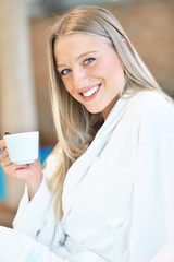 Horizontal view of woman drinking tea in spa