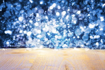 Fototapeta na wymiar Christmas Background With Blue Bright Shiny Lights