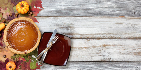 Baked homemade pumpkin pie for Autumn holiday dessert