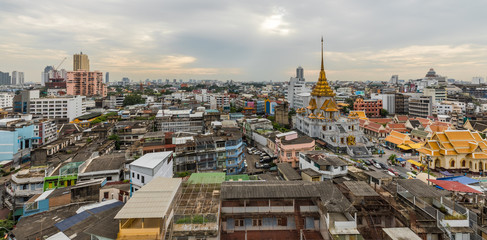 Top view cityscape with Wat Trimit temple in China town area in Bangkok, Thailand