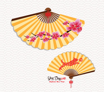Classic Chinese new year blossom and oriental folding Paper Fan. Year of the dog. Chinese character hieroglyph: Dog