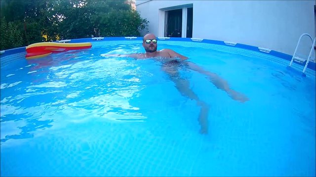 Man in swimming pool. 
