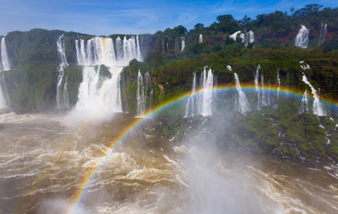 Rainbow over Cataratas del Iguazu waterfall, Brazil