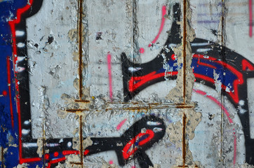 Texture of a fragment of the wall with graffiti painting, which is depicted on it. An image of a...