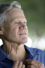 Profile of a mature man with gray hair