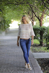 Fototapeta premium Sexy blond walking down the street