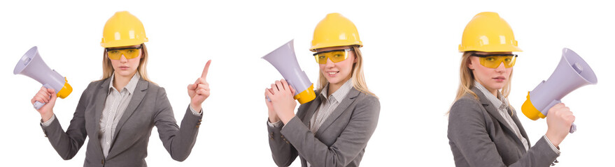 Female engineer in helmet with loudspeaker isolated on white