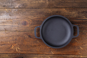 Portioned cast-iron frying pan