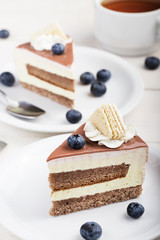 Pieces of cake on a plate and tea