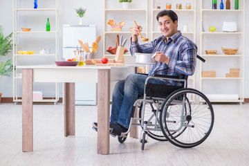 Disabled man preparing soup at kitchen