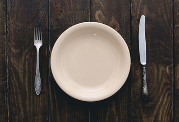 cutlery on wooden table
