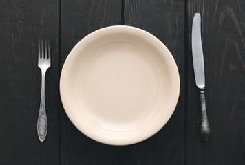 cutlery on wooden table