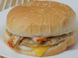 Low cost pork burger with bacon and cheese