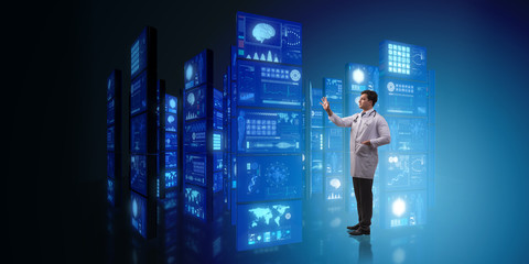 Doctor in telemedicine concept pressing buttons