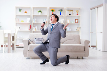 Drunk businessman celebrating in the office