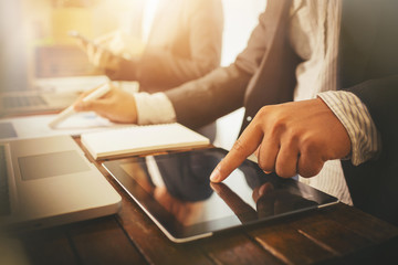 Buyer and real estate agent housing team.