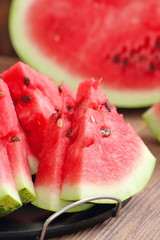 Watermelon slices on the table in summertime