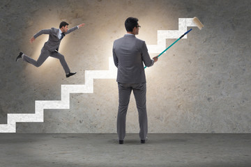 Businessman in career ladder concept