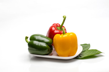 Three sweet pepper on white background.