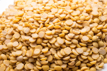 Dry yellow split peas isolated on white background (Soybean halves)