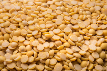 Dry yellow split peas isolated on white background (Soybean halves)