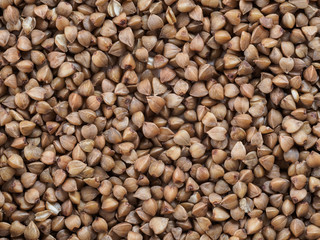 buckwheat grains background. Copy space. Top view or flat lay.