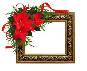 Christmas red poinsettia flowers corner arrangement with ribbon bow and decorative frame