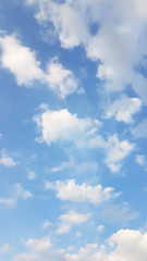 Fresh blue sky with spread white clouds