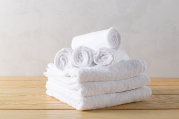 Fototapeta na wymiar spa towels on wooden surface